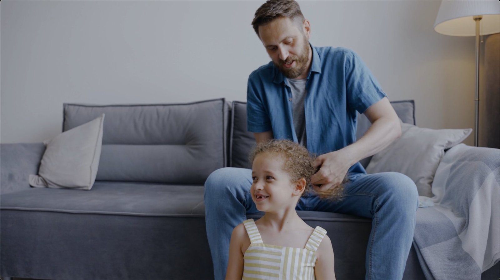 A father spending time with his daughter at home