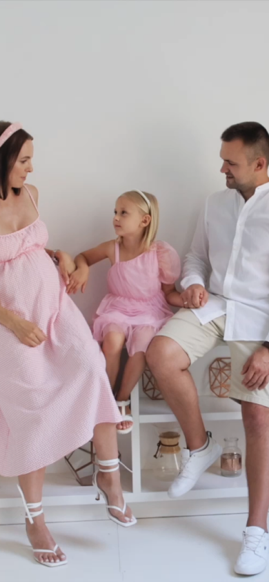 A family sitting together at home